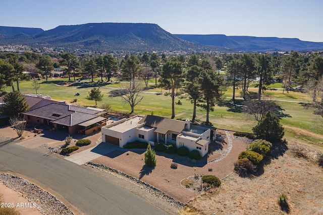 bird's eye view with a mountain view