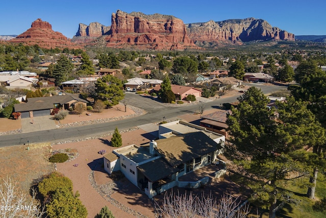 drone / aerial view featuring a mountain view