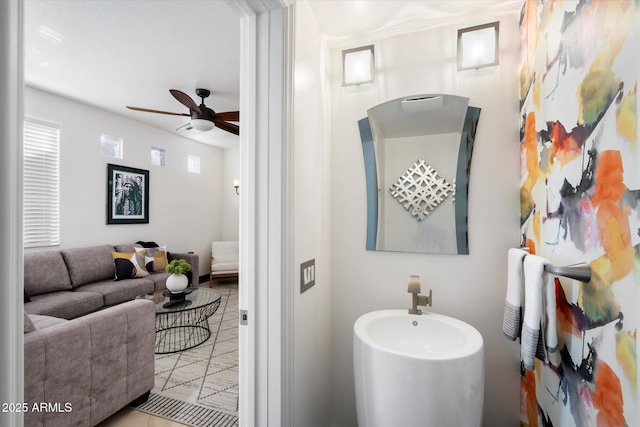 bathroom featuring ceiling fan