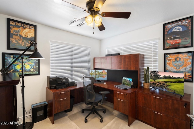 office area with a ceiling fan