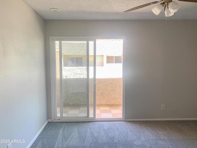 2155 W Farmdale Ave Unit 8, Mesa, AZ 85202 - carpeted spare room featuring a textured ceiling, ceiling fan, and baseboards