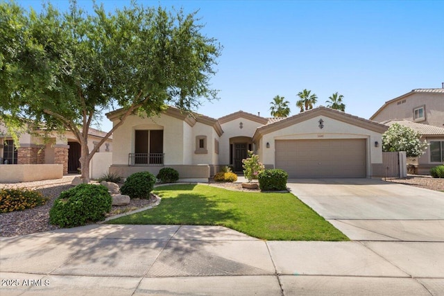 1680 S Arroyo Ln, Gilbert, AZ 85295 - mediterranean / spanish house with concrete driveway, stucco siding, and an attached garage