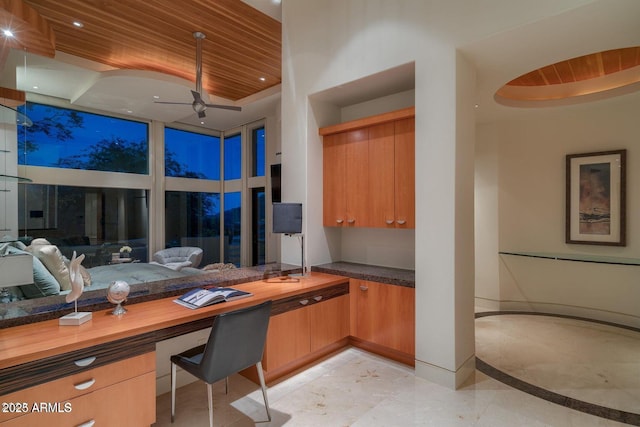 office with built in study area, wooden ceiling, ceiling fan, a high ceiling, and recessed lighting