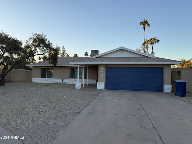 2429 E Alameda Dr, Tempe, AZ 85282 - ranch-style house with driveway, a shingled roof, fence, cooling unit, and a garage