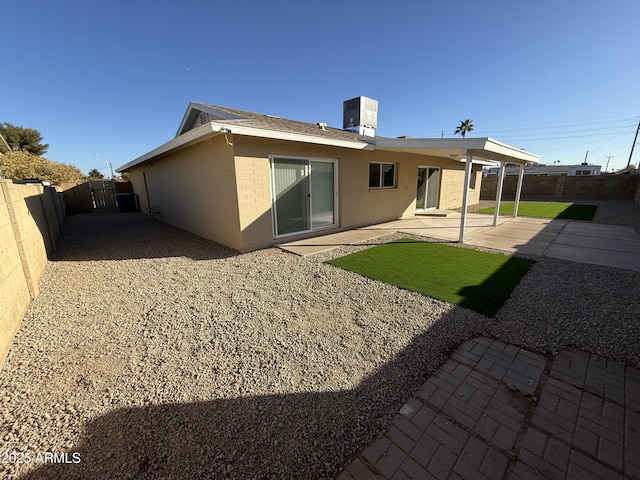 2429 E Alameda Dr, Tempe, AZ 85282 - rear view of property featuring a fenced backyard, cooling unit, and a patio
