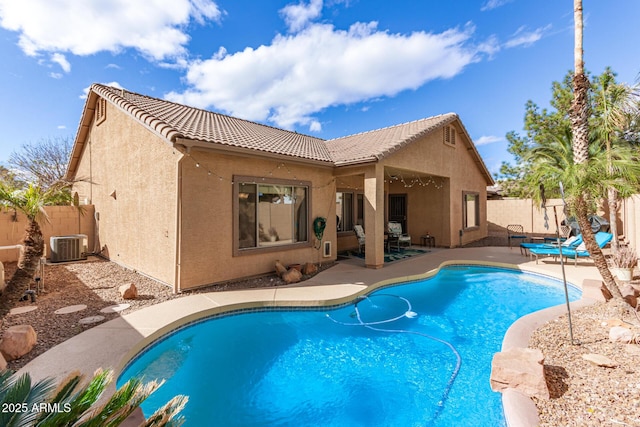 view of pool featuring central AC and a patio area