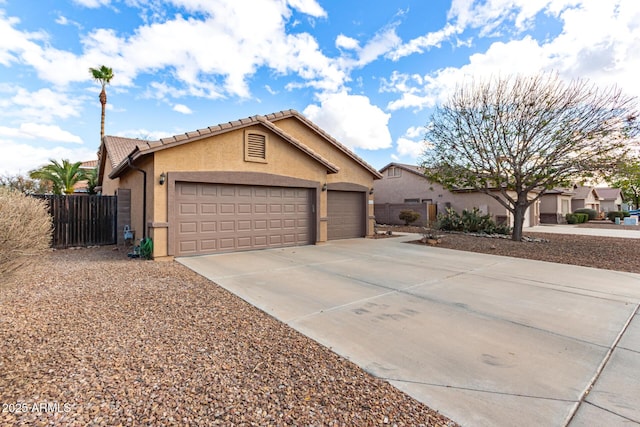 ranch-style house featuring a garage