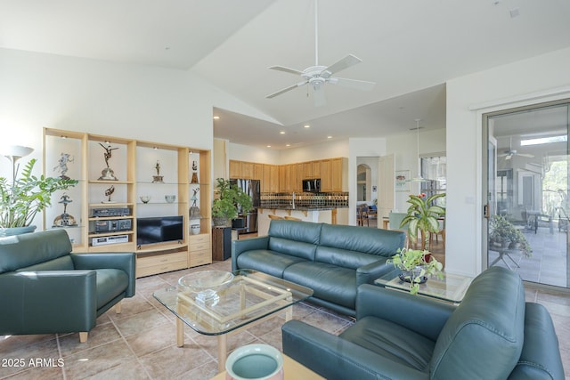 living area featuring light tile patterned flooring, lofted ceiling, a ceiling fan, and recessed lighting