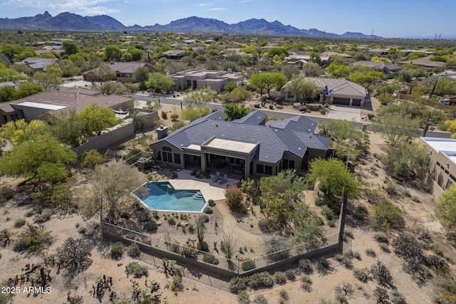 bird's eye view featuring a residential view and a mountain view