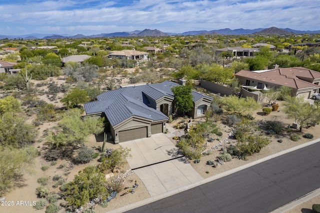 bird's eye view with a residential view and a mountain view