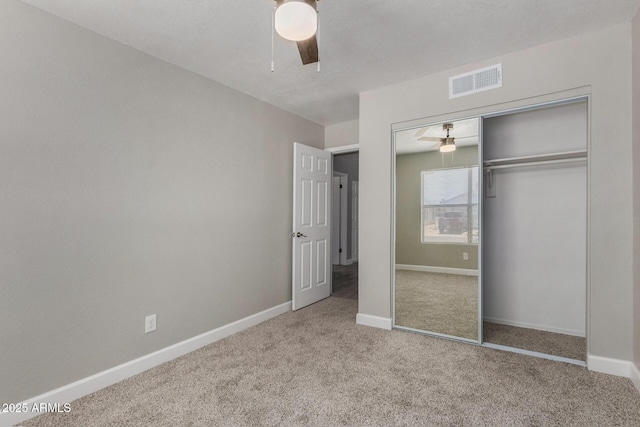8720 W Willowbrook Dr, Peoria, AZ 85382 - unfurnished bedroom featuring carpet flooring, a closet, and a ceiling fan