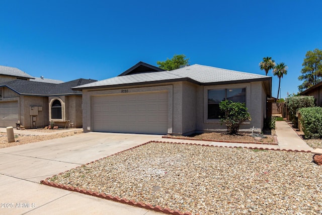 8720 W Willowbrook Dr, Peoria, AZ 85382 - ranch-style home with a garage, driveway, and stucco siding