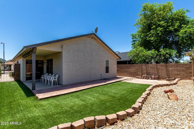 8720 W Willowbrook Dr, Peoria, AZ 85382 - rear view of property with a patio and stucco siding