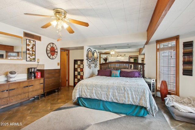 tiled bedroom with visible vents