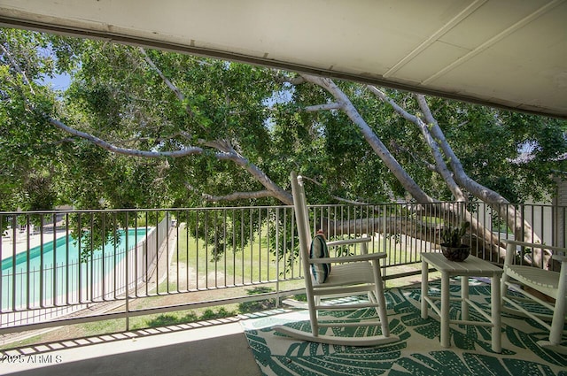 1107 W Osborn Rd Unit 213, Phoenix, AZ 85013 - patio / terrace featuring view of wooded area