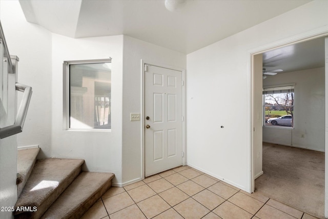 entrance foyer with light tile patterned floors