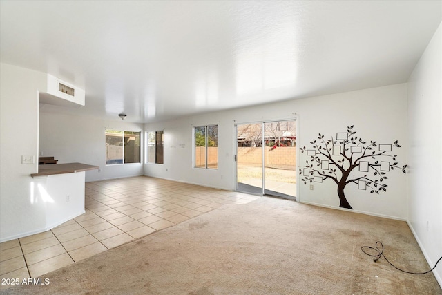 empty room with light colored carpet