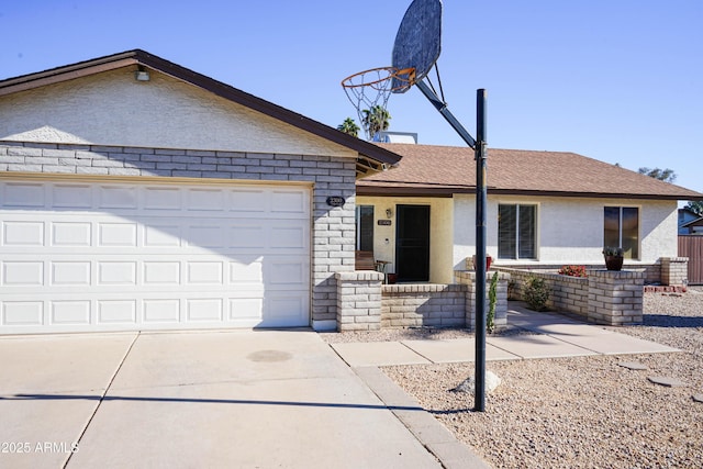 ranch-style home featuring a garage