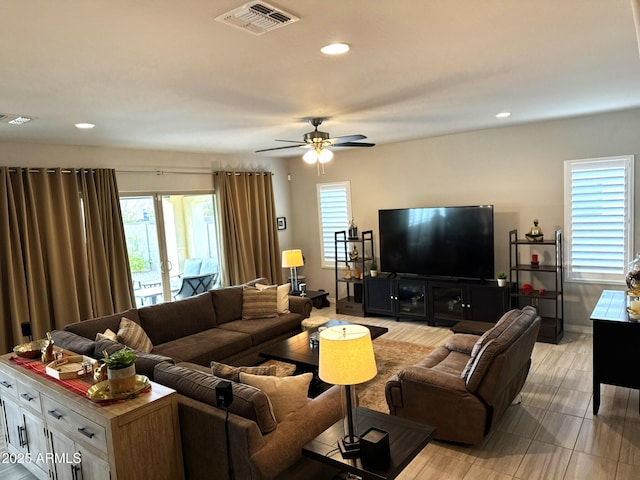 living room with ceiling fan