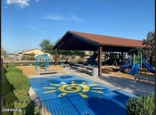 surrounding community featuring a playground