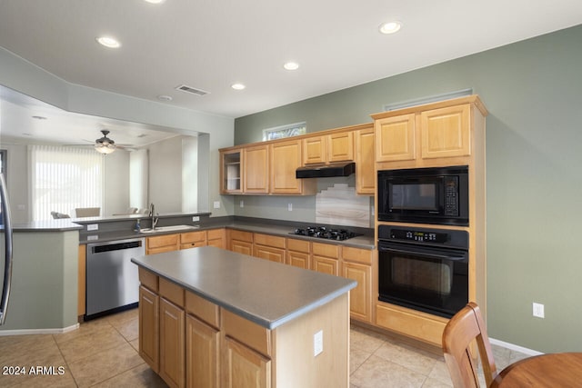 kitchen featuring ceiling fan, sink, light brown cabinets, a kitchen island, and black appliances