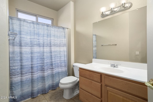 bathroom featuring tile patterned flooring, vanity, toilet, and a shower with curtain