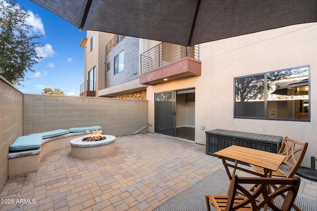 view of patio / terrace with a fire pit