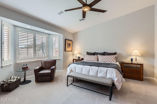 carpeted bedroom featuring visible vents, ceiling fan, and baseboards