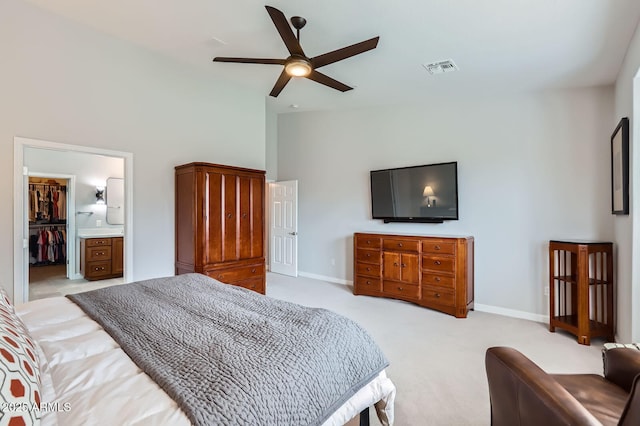 bedroom with light carpet, visible vents, a ceiling fan, and baseboards