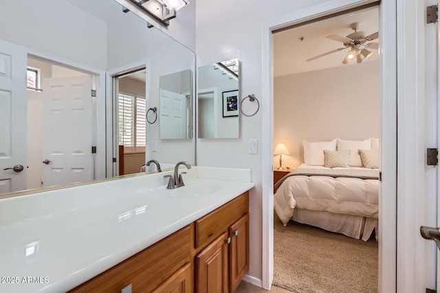 bathroom with vanity and a ceiling fan