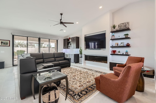 living room with light tile patterned floors, baseboards, lofted ceiling, recessed lighting, and ceiling fan