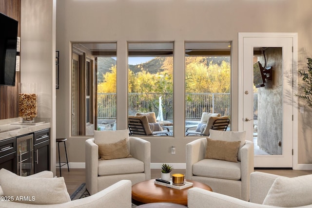 interior space featuring baseboards and wood finished floors