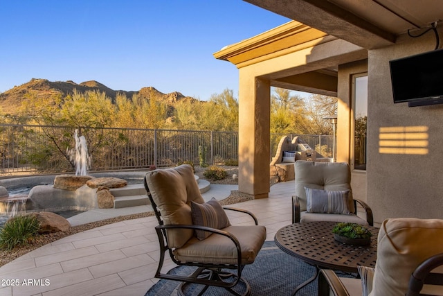 view of patio with fence