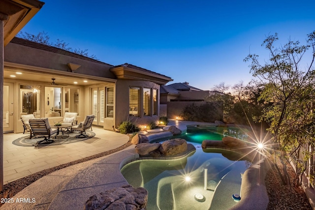 view of patio / terrace featuring a fenced in pool