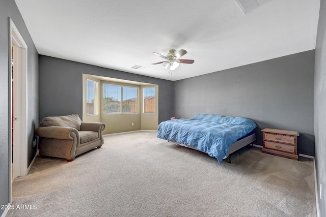 1384 S 222nd Ln, Buckeye, AZ 85326 - carpeted bedroom featuring a ceiling fan and baseboards