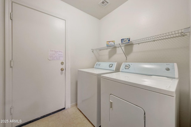 1384 S 222nd Ln, Buckeye, AZ 85326 - laundry room featuring independent washer and dryer and baseboards