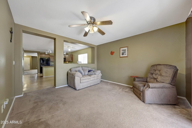 1384 S 222nd Ln, Buckeye, AZ 85326 - living room featuring ceiling fan and carpet