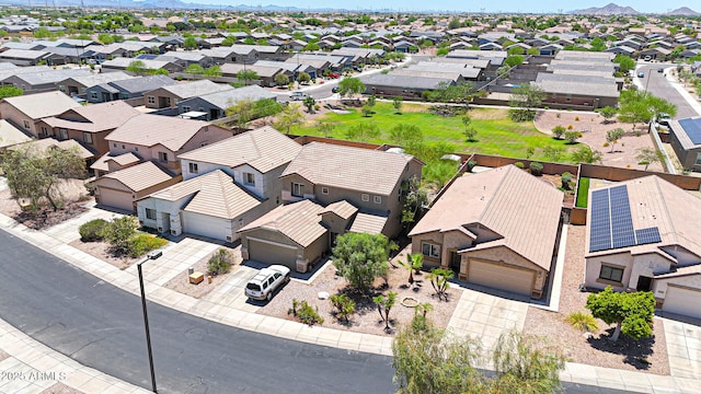 1384 S 222nd Ln, Buckeye, AZ 85326 - aerial perspective of suburban area featuring a mountain backdrop