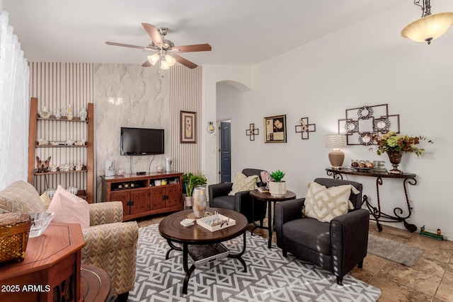 living room featuring ceiling fan