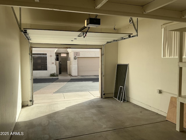 garage featuring a garage door opener