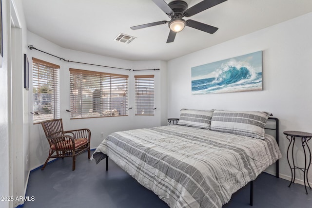 bedroom with baseboards, visible vents, and ceiling fan