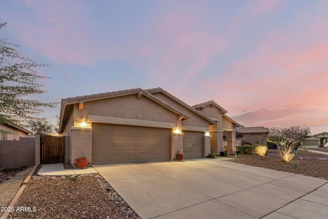 view of front of property featuring a garage