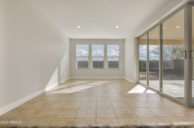 view of tiled spare room