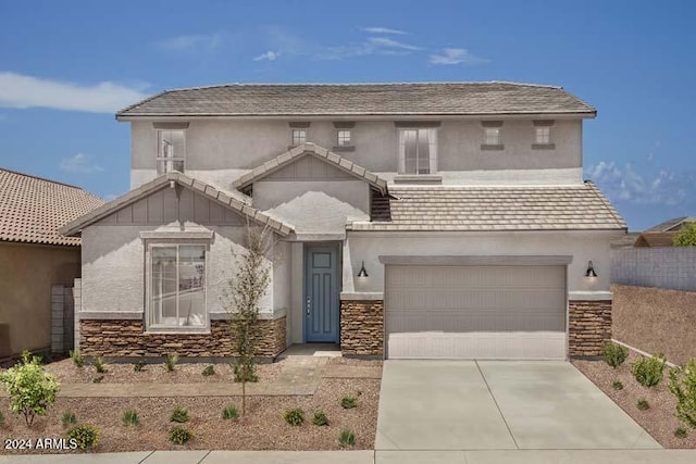 view of front of property with a garage