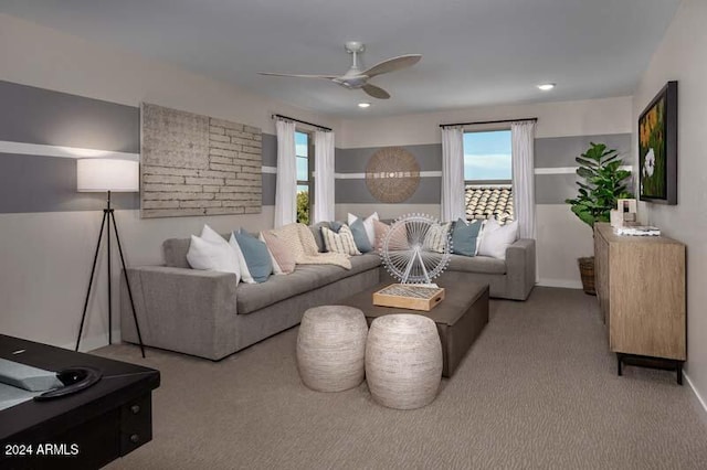 living room featuring light colored carpet and ceiling fan