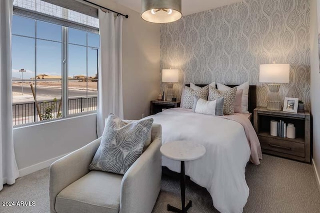 26982 N 168th Ln, Surprise, AZ 85387 - carpeted bedroom with baseboards and wallpapered walls