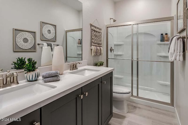 26982 N 168th Ln, Surprise, AZ 85387 - bathroom with a stall shower, toilet, and double vanity
