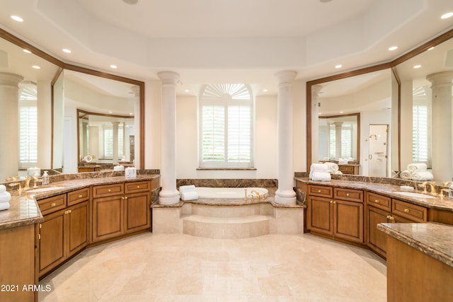 10754 E Laurel Ln, Scottsdale, AZ 85259 - full bath featuring ornate columns, healthy amount of natural light, a garden tub, recessed lighting, and vanity