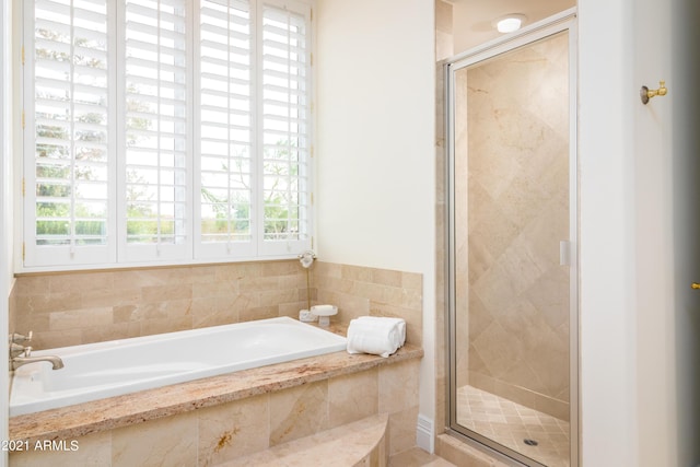 10754 E Laurel Ln, Scottsdale, AZ 85259 - full bath featuring plenty of natural light, a garden tub, and a stall shower