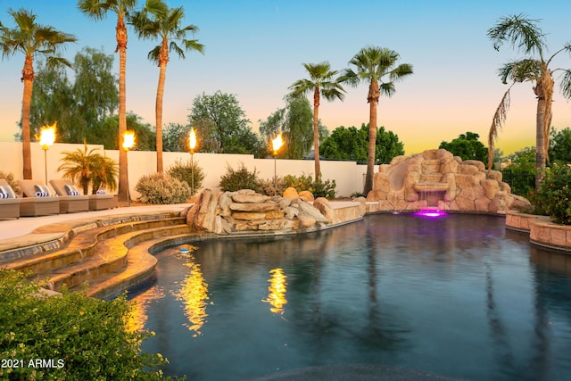10754 E Laurel Ln, Scottsdale, AZ 85259 - pool at dusk with a fenced backyard